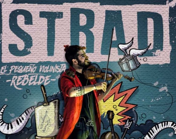 Strad toca el violín delante de un grafiti